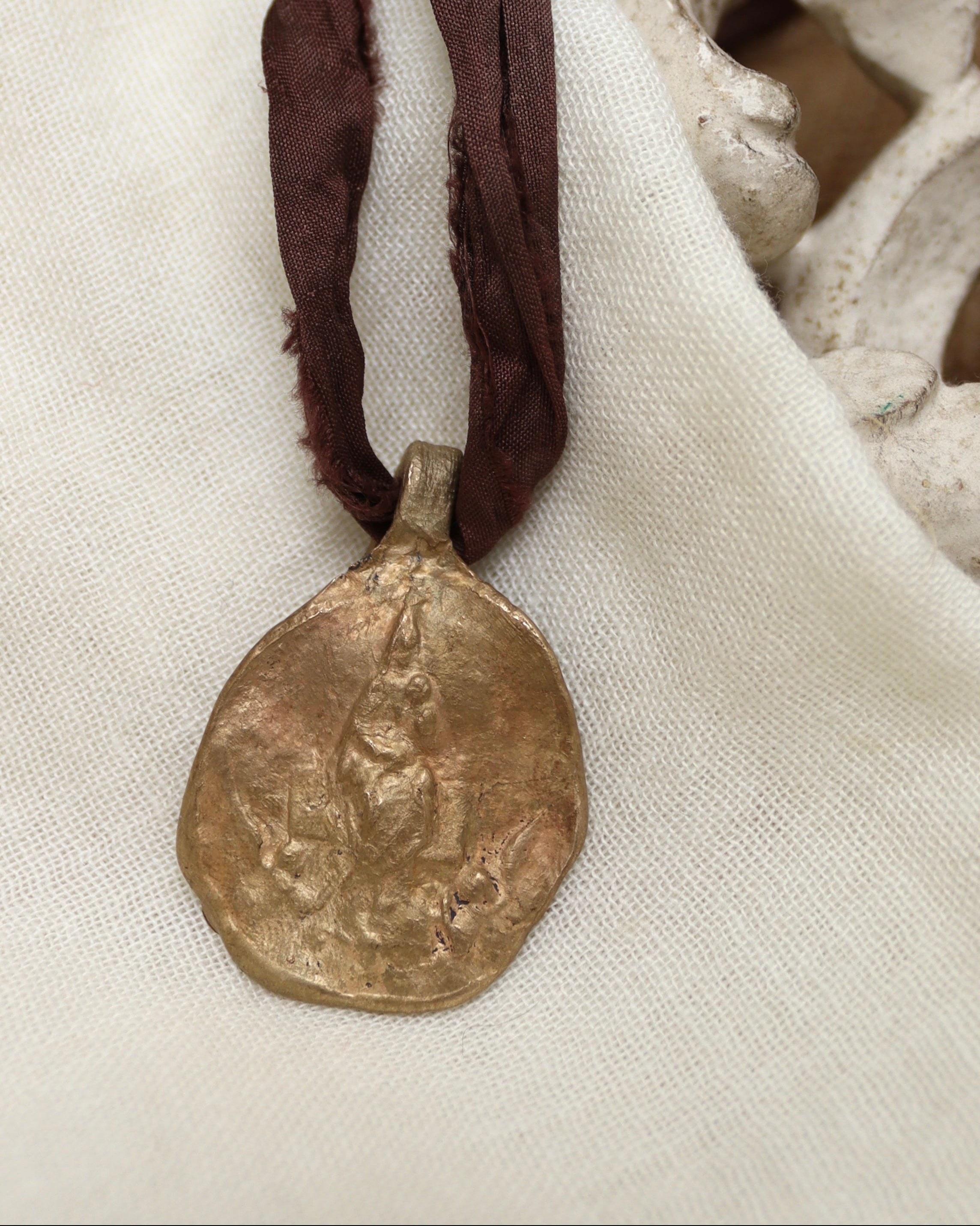 Virgin of Loreto Pendant - gold-colored brass