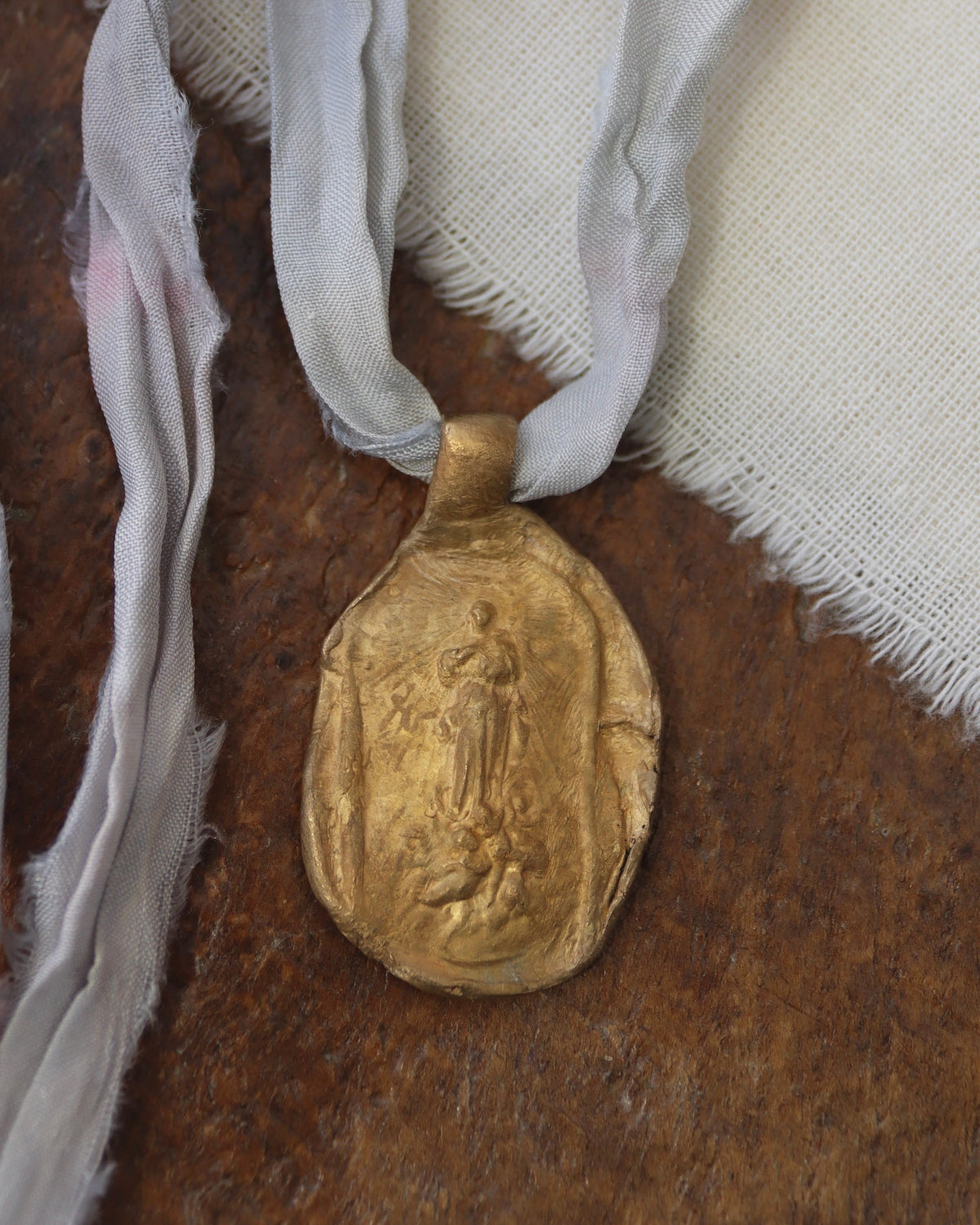 Our Lady of the Assumption Pendant - gold-colored brass