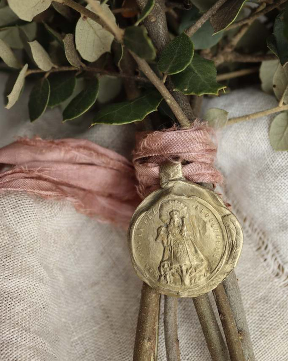 Our Lady of Peace Branch - gold-colored brass