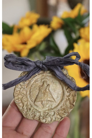 Medalla Cuna TXL latón