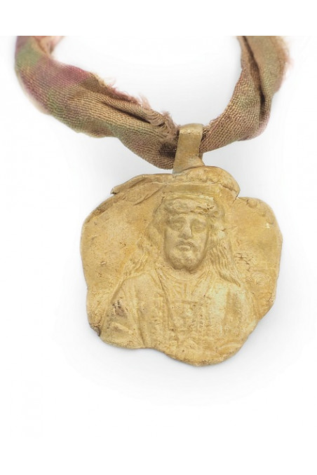 Medalla colgante latón TM