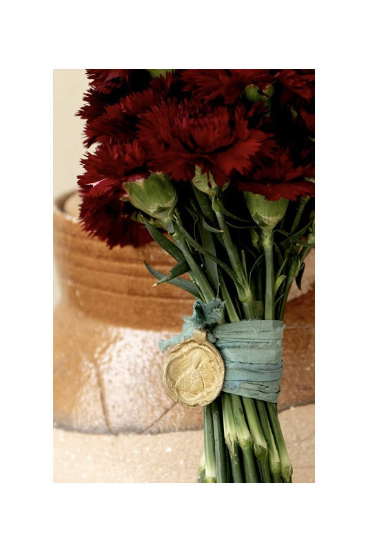 Medalla rústica de San Fermín para ramo en latón. Hecha artesanalmente por Sandra Bellew.