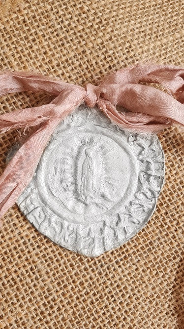 Medalla cuna plata TXL