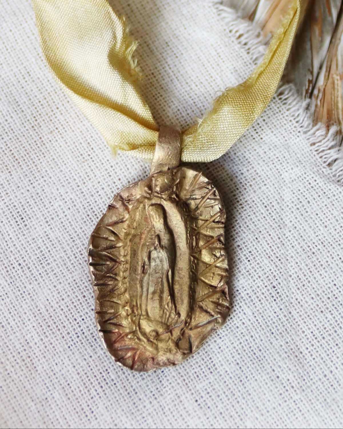 Our Lady of Guadalupe Pendant - gold-colored brass