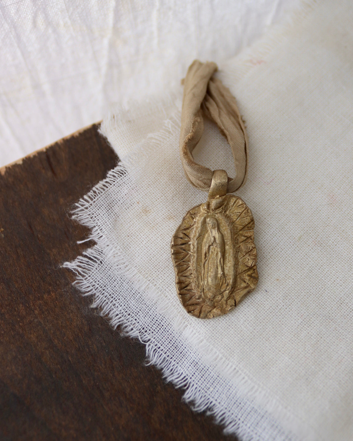 Our Lady of Guadalupe Pendant - gold-colored brass